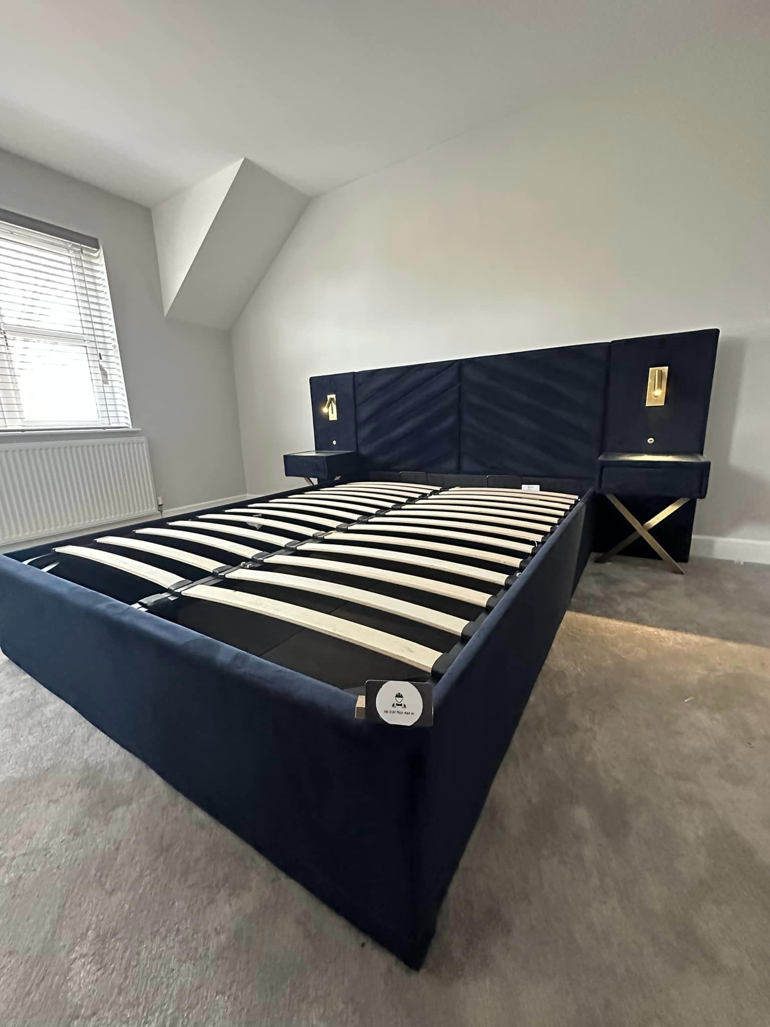 Navy velvet bed with wooden slots
